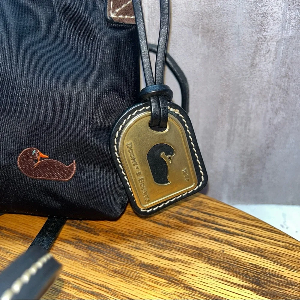 DOONEY & BOURKE Black Nylon Leather Trim Crossbody Purse Gold Charm Duck Logo